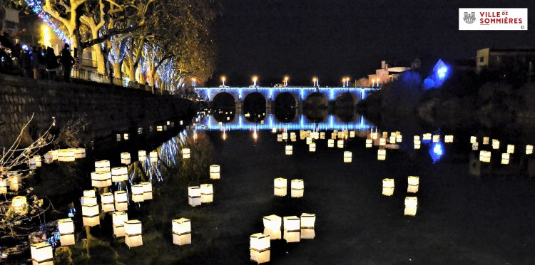 Visite de la ville en images Illuminations du pont romain avec lach� de lanternes sur l'eau : 1654779790.illuminations.du.pont.romain.jpg